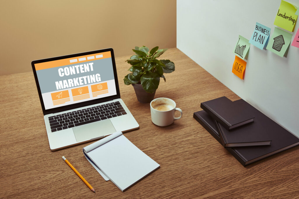 Blogger planning a content marketing strategy on a laptop